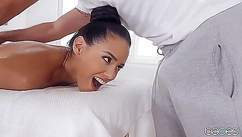 Brunette gets a massage by a fat guy in a hot scene