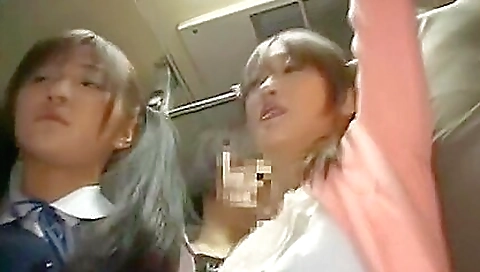 Asian stepmom and her stepdaughter suck a big dildo