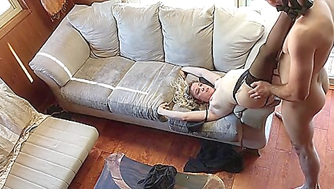 Gorgeous blonde takes care of pussy in sexy lingerie