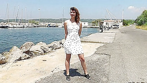 Sexy busty milf shows hair on camera and makes face