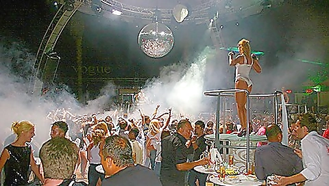 Blonde brunette with a pair of sexy boots and boots