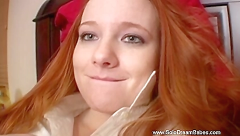 Slutty redhead babe rides a hard pole and masturbates