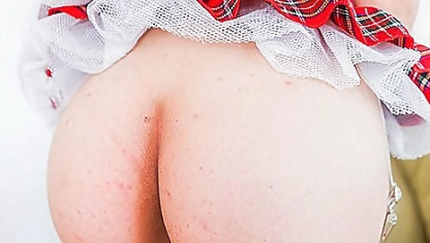 Buxom brunette teen with natural hair is getting excited in the studio