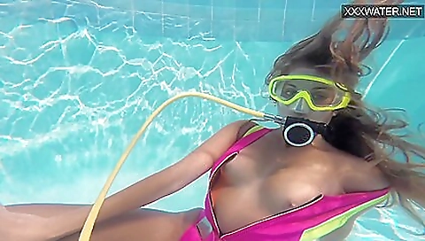 Big tittied blonde is showing herself on the beach