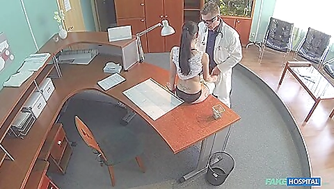 A busty pornstar with some tattoos doing some fingering here