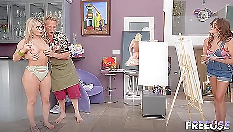 Tattooed blonde milf enjoys a threesome with a big dick